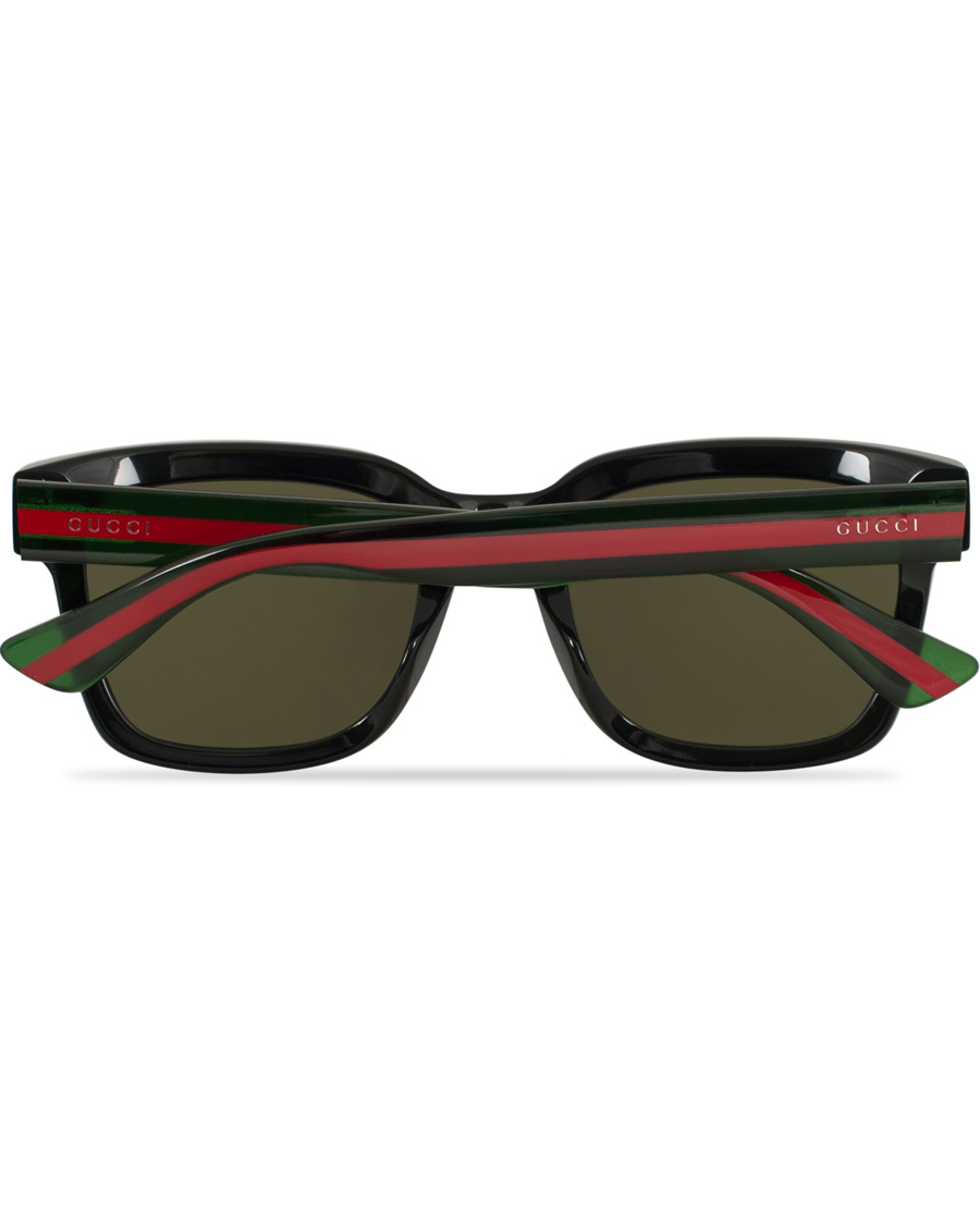 Homme | Gucci GG0001S Sunglasses Black/Green | Gucci | GG0001S Sunglasses Black/Green