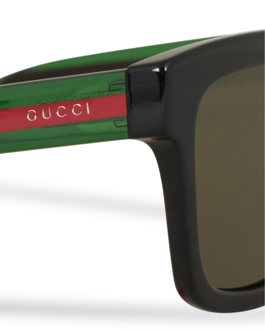 Homme | Gucci GG0001S Sunglasses Black/Green | Gucci | GG0001S Sunglasses Black/Green