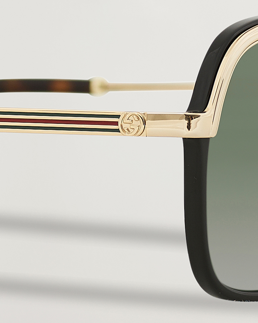 Homme | Gucci GG0200S Sunglasses Black/Gold | Gucci | GG0200S Sunglasses Black/Gold