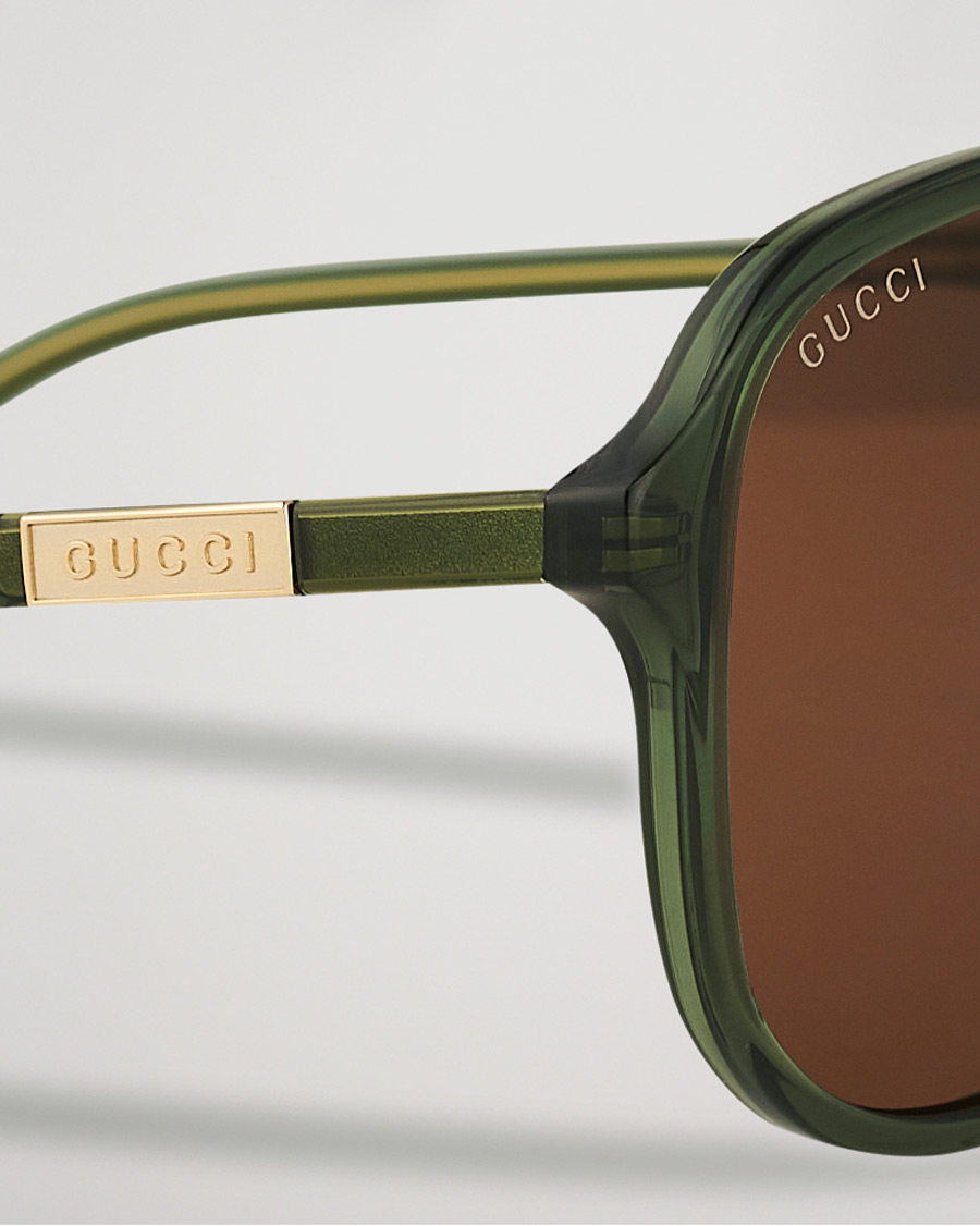 Homme | Gucci GG1156S Sunglasses Green/Brown | Gucci | GG1156S Sunglasses Green/Brown