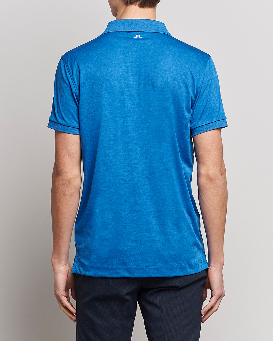 Homme | Polos | J.Lindeberg | Tour Tech Regular Fit Polo Lapis Blue Melange