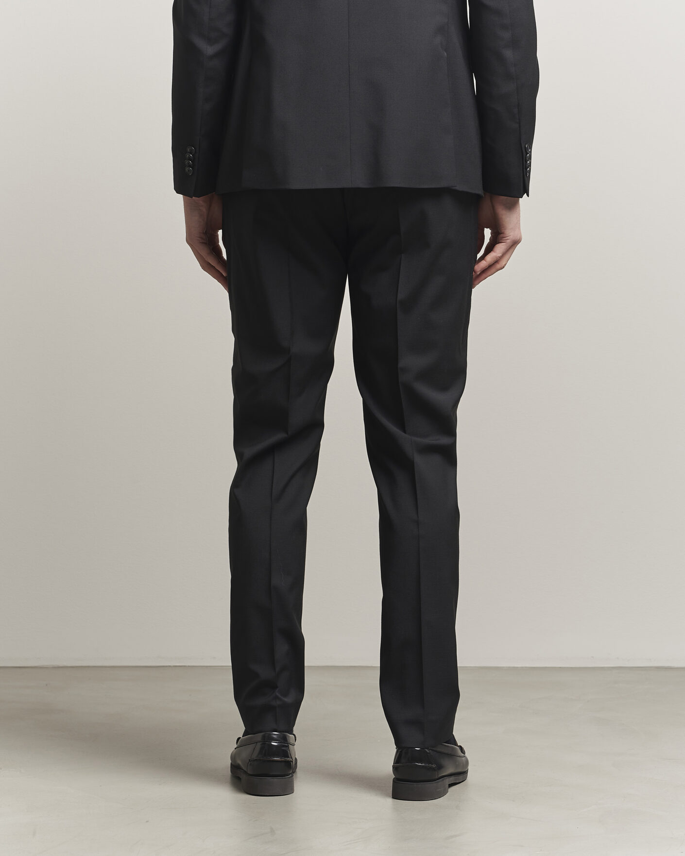 Homme | Pantalons | Tiger of Sweden | Tenuta Wool Travel Suit Trousers Black