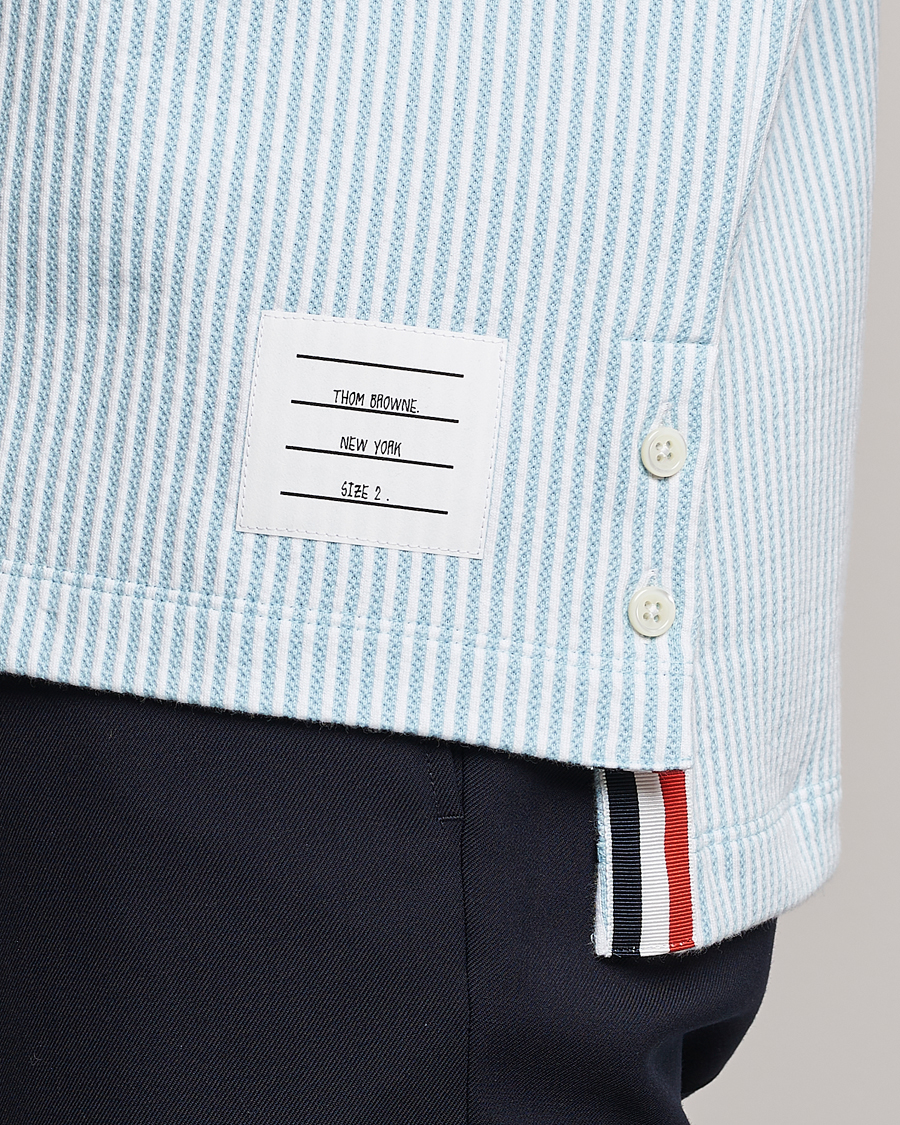 Homme | Polos | Thom Browne | Short Sleeve Seersucker Polo Light Blue