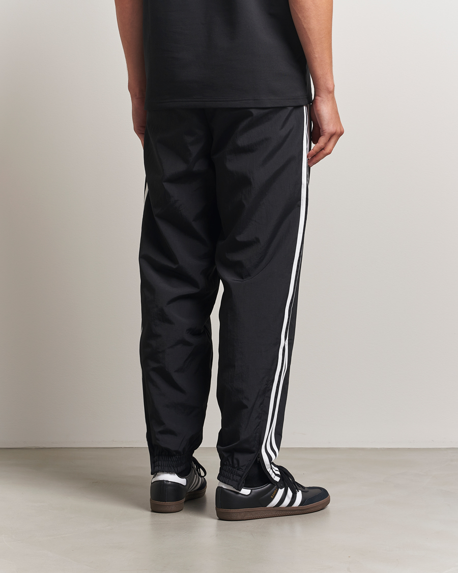 Homme | Pantalons | adidas Originals | Firebird Track Pants Black/White