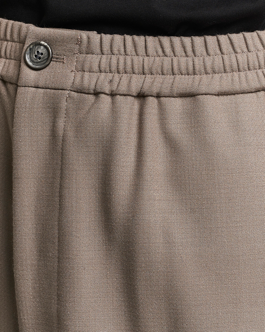 Homme | Pantalons | AMI | Wool Drawstring Trousers Taupe