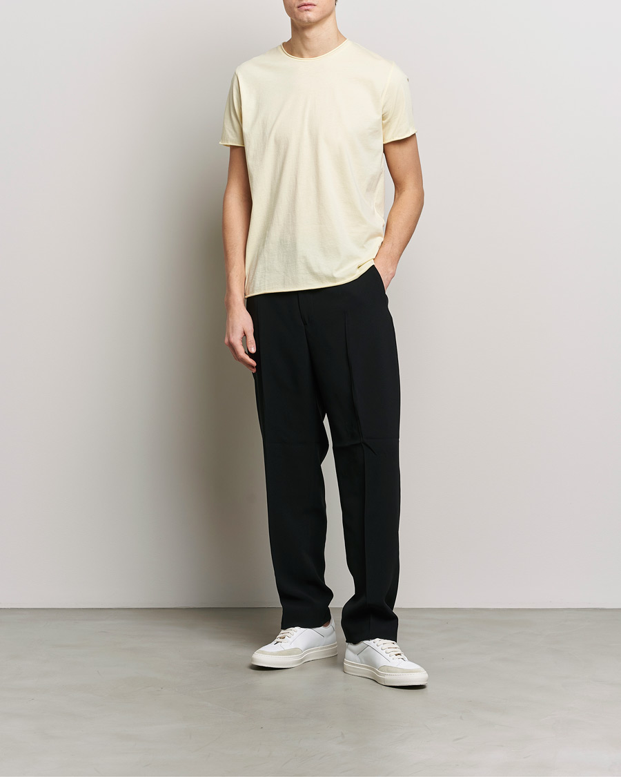 Homme | T-shirts | Filippa K | Roll Neck Crew Neck T-Shirt Soft Yellow