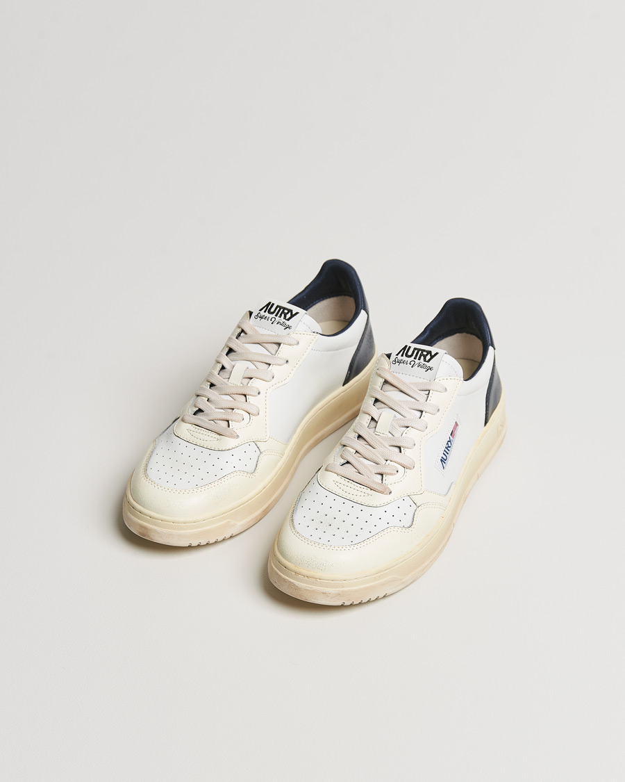 Homme | Autry Super Vintage Low Leather Sneaker White/Navy | Autry | Super Vintage Low Leather Sneaker White/Navy