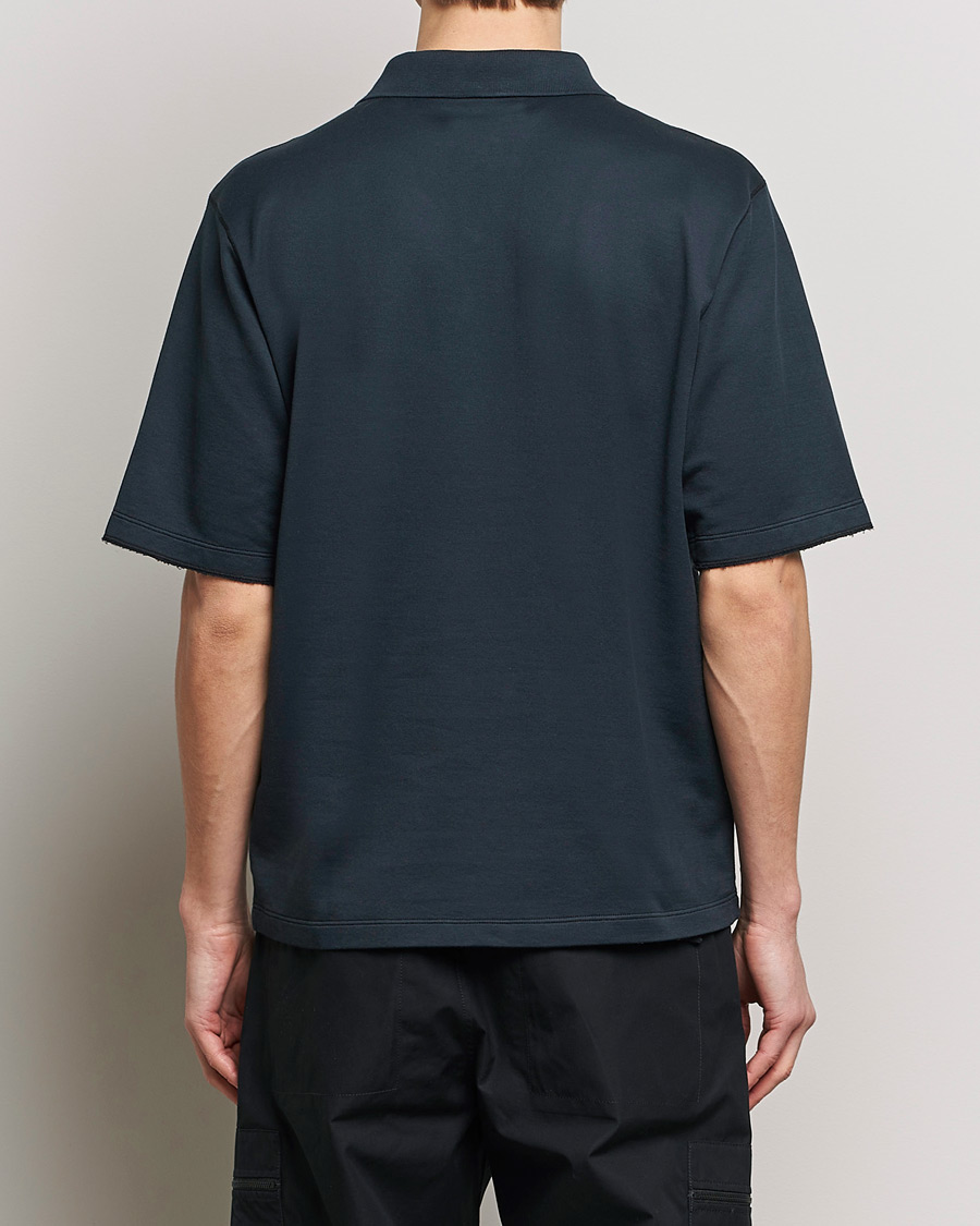 Homme | Polos | Stone Island | Ghost Garment Dyed Organic Cotton Poloshirt Navy Blue
