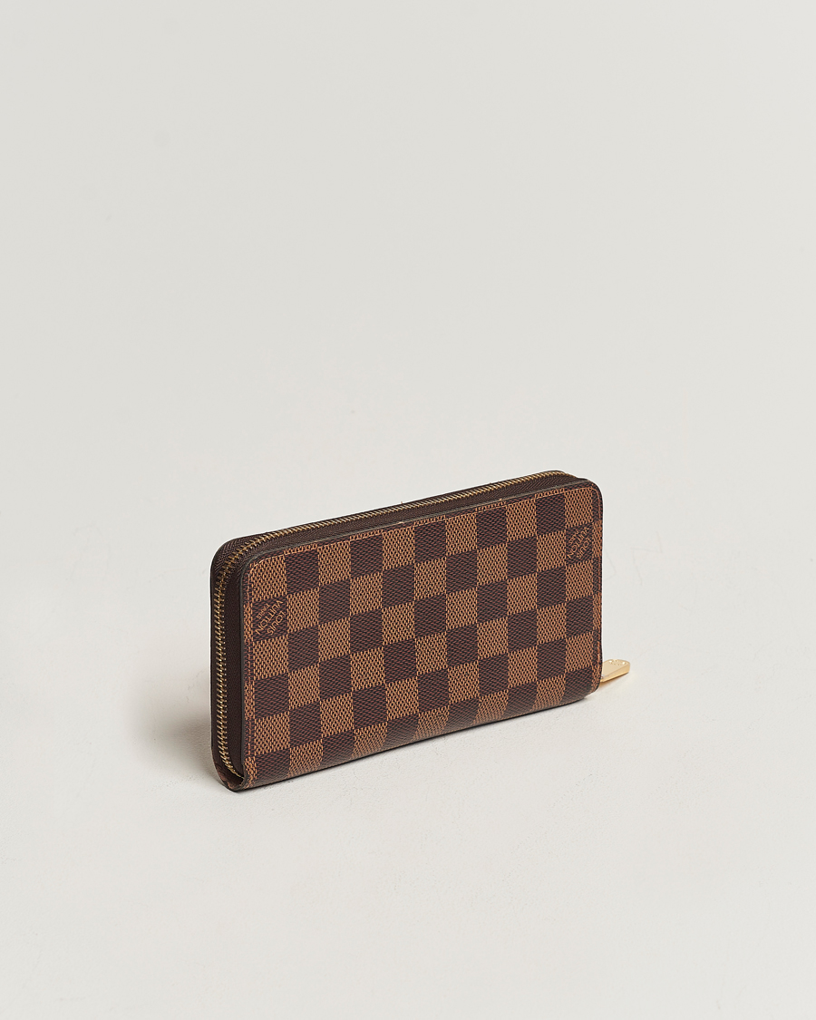 Homme | Louis Vuitton Pre-Owned Zippy Wallet Damier Ebene | Louis Vuitton Pre-Owned | Zippy Wallet Damier Ebene