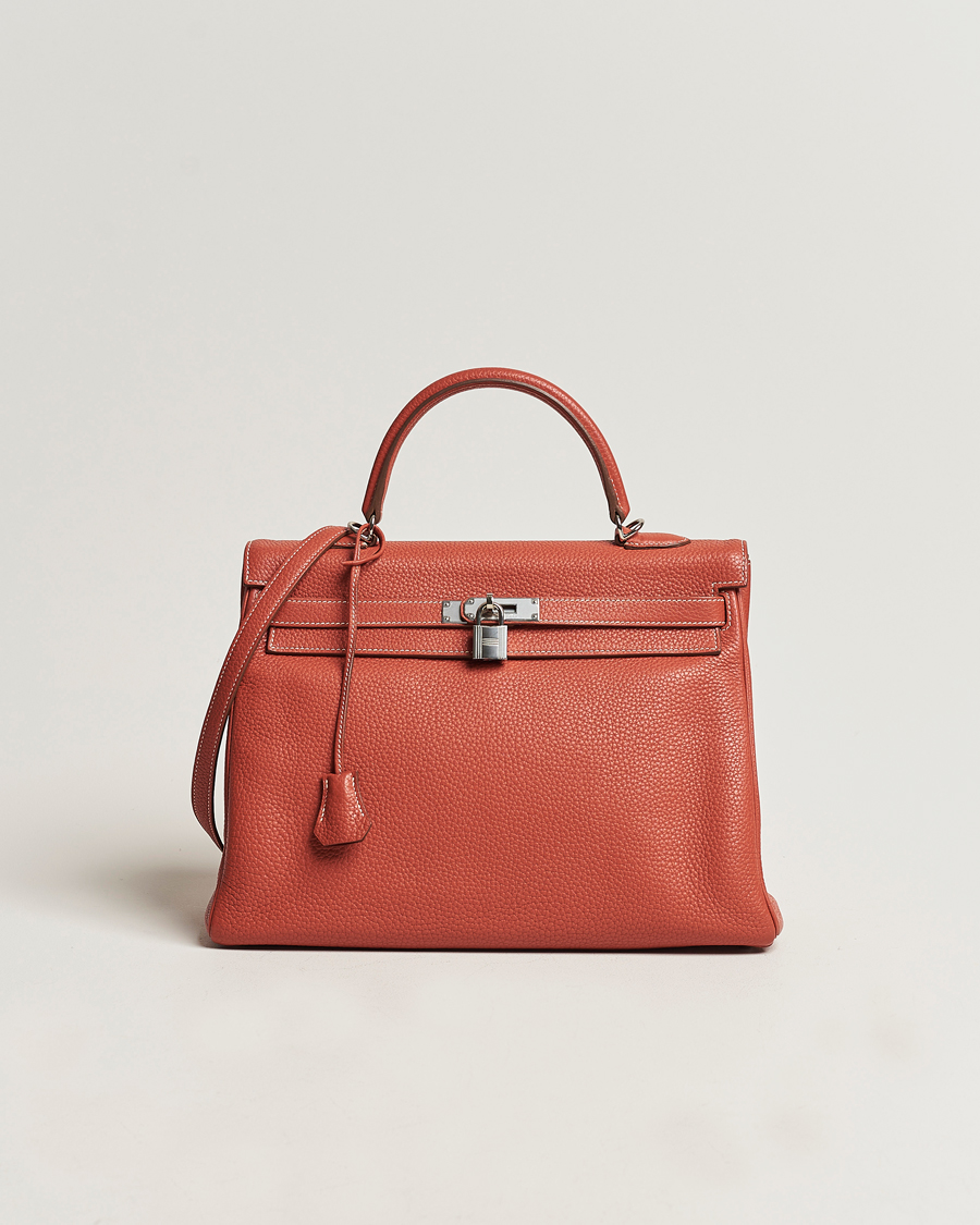 Homme | Hermès Pre-Owned Kelly 35 Handbag Taurillion Clemence Orange | Hermès Pre-Owned | Kelly 35 Handbag Taurillion Clemence Orange