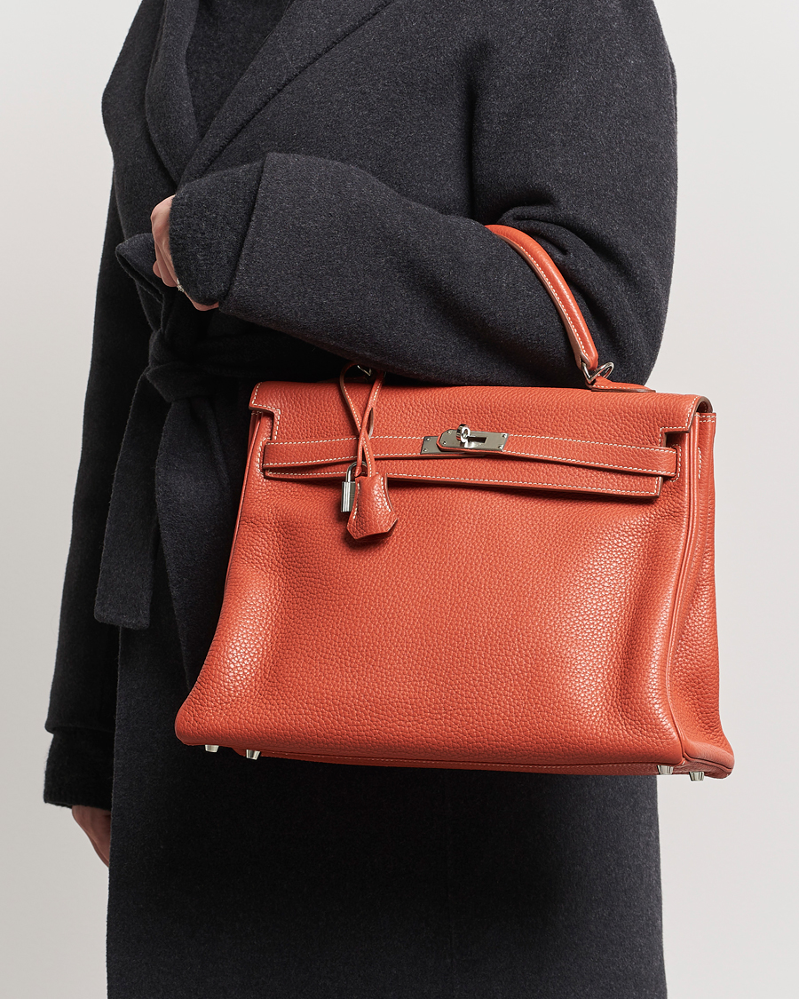 Homme |  | Hermès Pre-Owned | Kelly 35 Handbag Taurillion Clemence Orange 