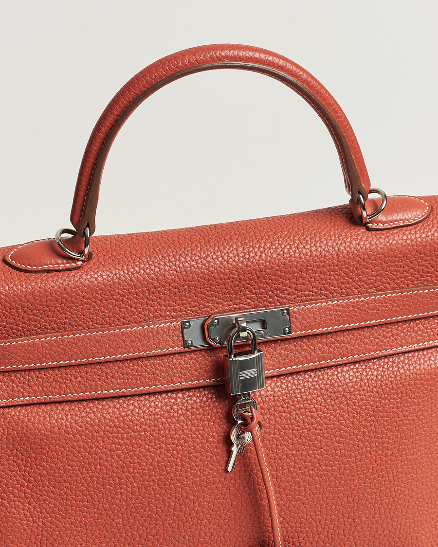 Homme | Hermès Pre-Owned Kelly 35 Handbag Taurillion Clemence Orange | Hermès Pre-Owned | Kelly 35 Handbag Taurillion Clemence Orange