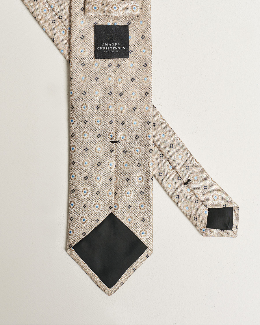 Homme | Amanda Christensen Linen/Silk Printed Flower 8cm Tie Beige | Amanda Christensen | Linen/Silk Printed Flower 8cm Tie Beige
