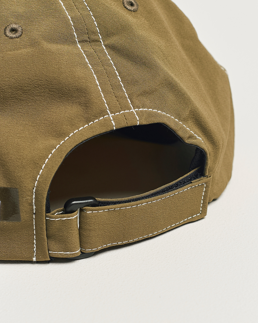 Homme | Satisfy PeaceShell Running Cap Oil Green | Satisfy | PeaceShell Running Cap Oil Green
