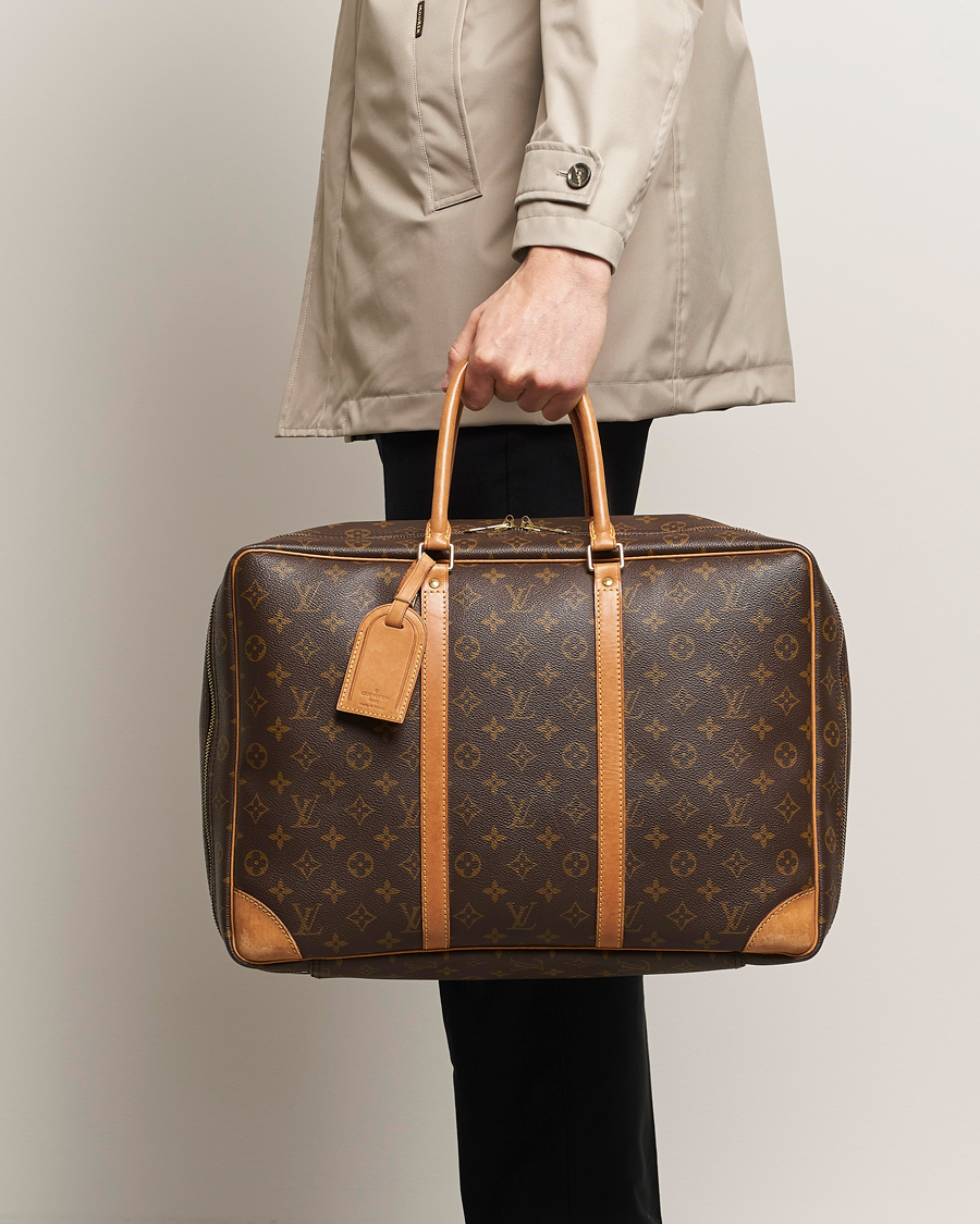 Homme | Louis Vuitton Pre-Owned Stratos Cloth bag Monogram | Louis Vuitton Pre-Owned | Stratos Cloth bag Monogram