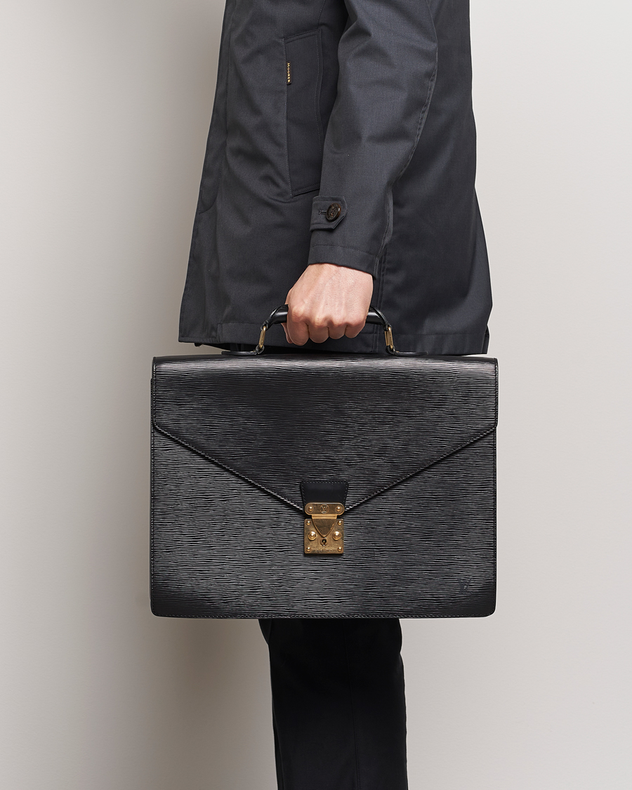 Homme | Louis Vuitton Pre-Owned Serviette Conseiller EPI Leather Briefcase | Louis Vuitton Pre-Owned | Serviette Conseiller EPI Leather Briefcase