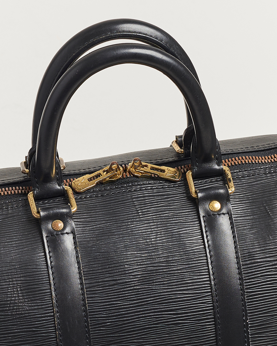Homme | Louis Vuitton Pre-Owned Keepall 45 EPI Leather Bag Black | Louis Vuitton Pre-Owned | Keepall 45 EPI Leather Bag Black