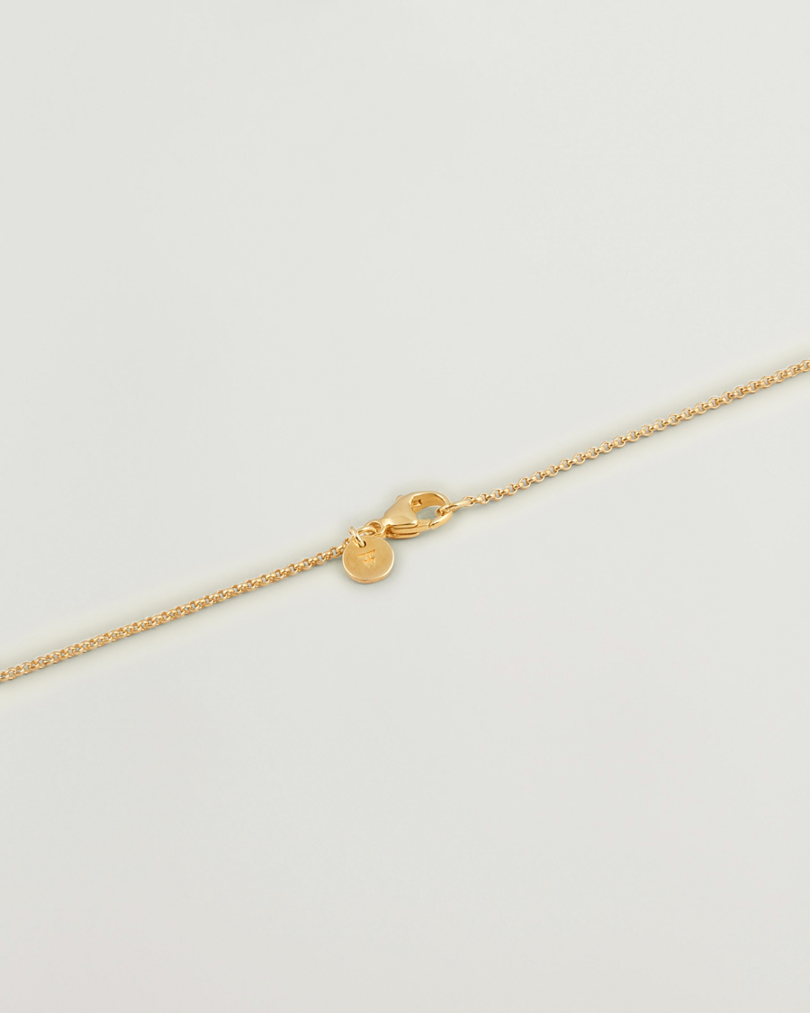 Homme | Tom Wood Cushion Pendant Tiger Eye Gold | Tom Wood | Cushion Pendant Tiger Eye Gold