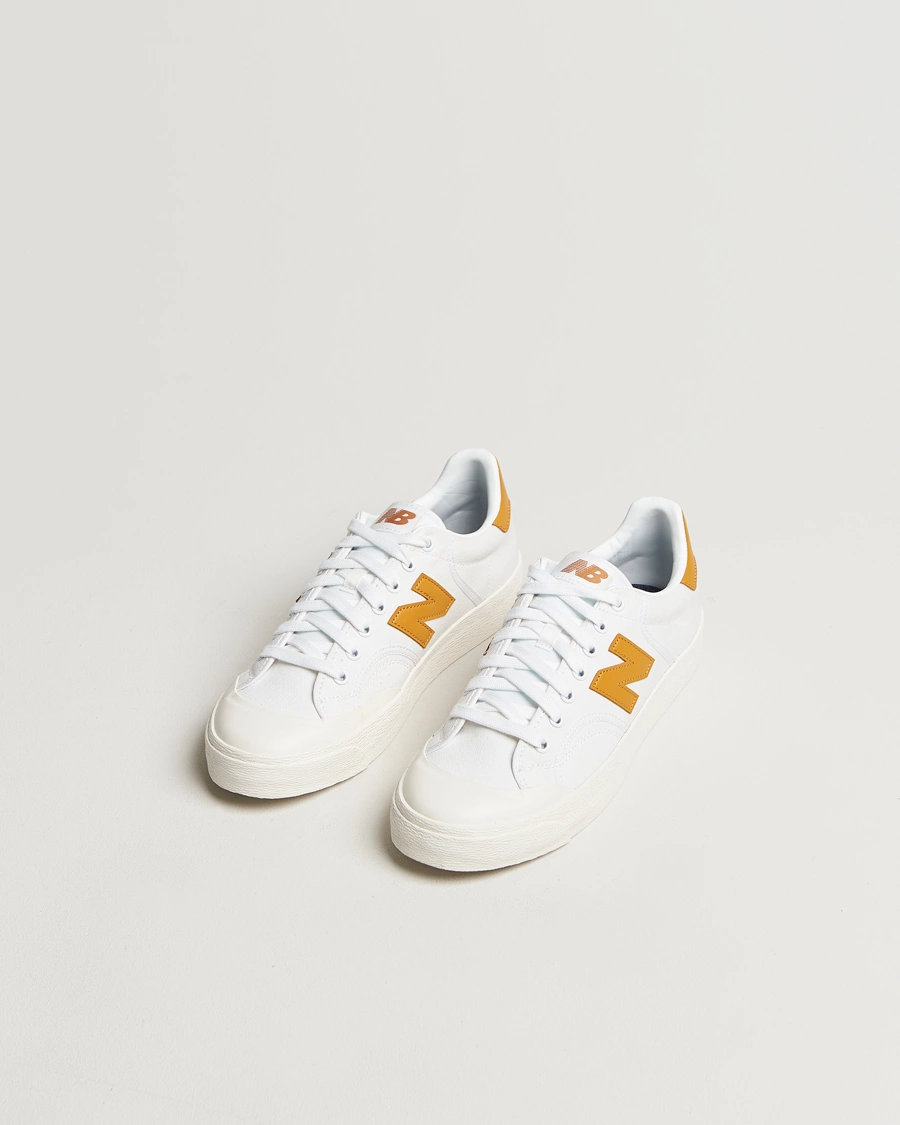Homme | New Balance B100 Sneakers White/Yellow | New Balance | B100 Sneakers White/Yellow