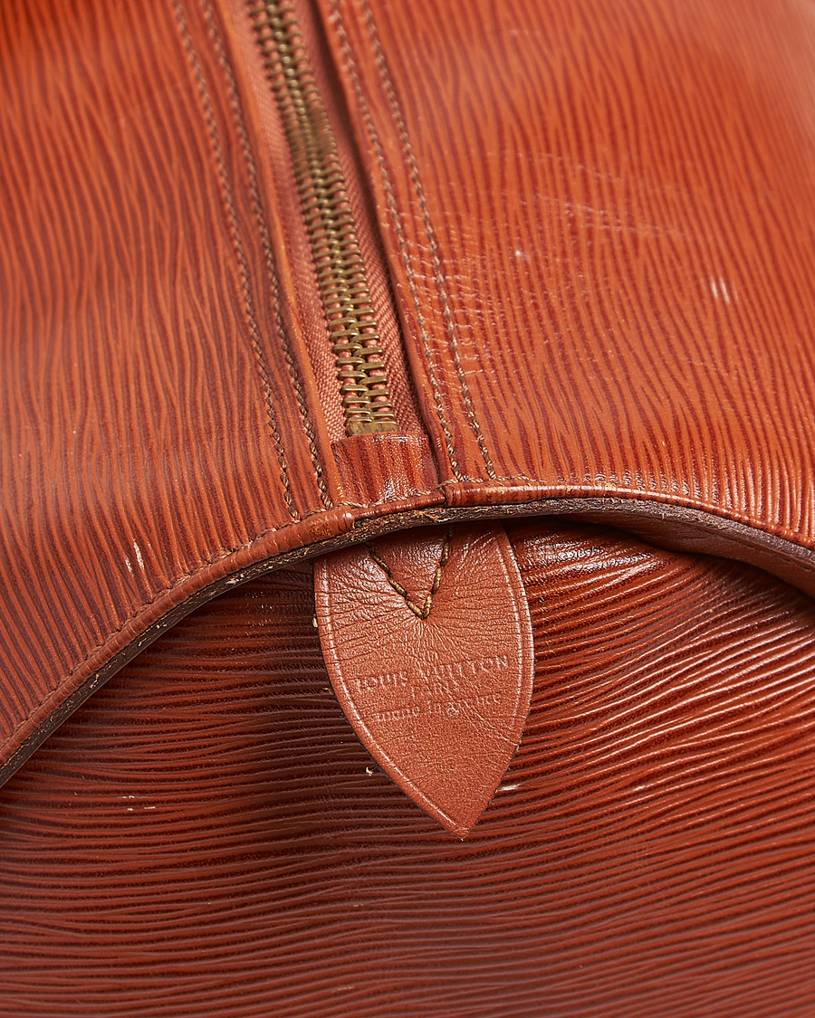Homme | Louis Vuitton Pre-Owned Keepall 50 Epi Leather Travel Bag Brown | Louis Vuitton Pre-Owned | Keepall 50 Epi Leather Travel Bag Brown