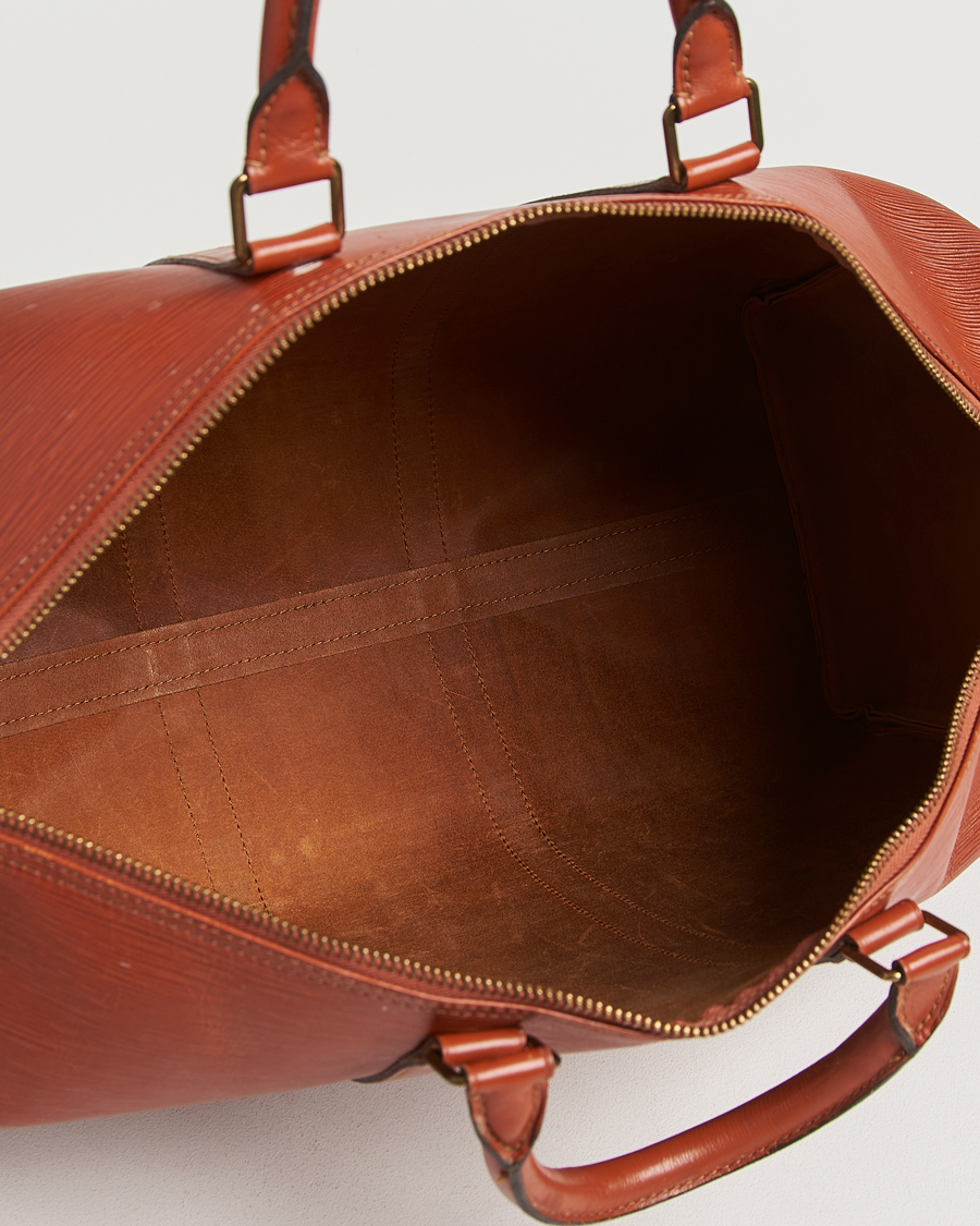 Homme | Louis Vuitton Pre-Owned Keepall 50 Epi Leather Travel Bag Brown | Louis Vuitton Pre-Owned | Keepall 50 Epi Leather Travel Bag Brown