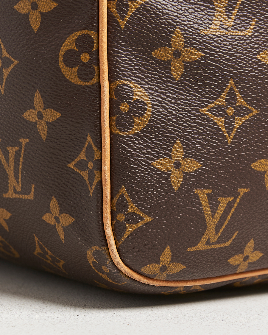 Homme | Louis Vuitton Pre-Owned Sac Souple 55 Monogram | Louis Vuitton Pre-Owned | Sac Souple 55 Monogram