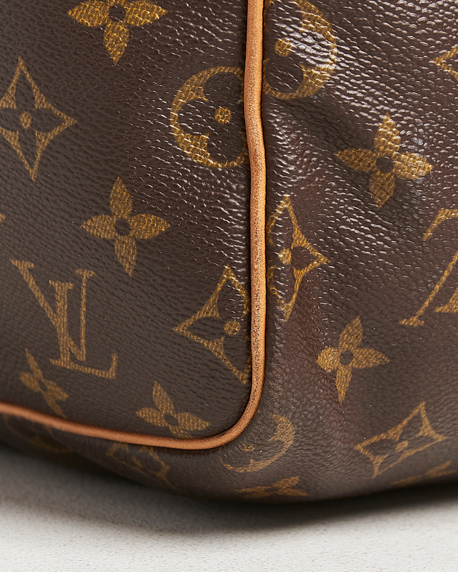 Homme | Louis Vuitton Pre-Owned Sac Souple 55 Monogram | Louis Vuitton Pre-Owned | Sac Souple 55 Monogram