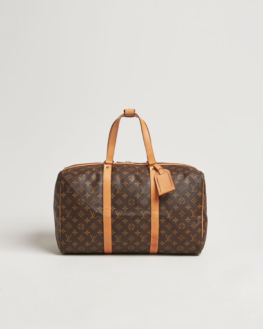 Homme | Louis Vuitton Pre-Owned Sac Souple 45 Monogram | Louis Vuitton Pre-Owned | Sac Souple 45 Monogram