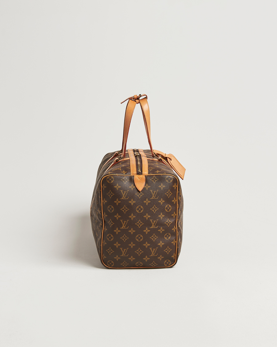 Homme | Louis Vuitton Pre-Owned Sac Souple 45 Monogram | Louis Vuitton Pre-Owned | Sac Souple 45 Monogram