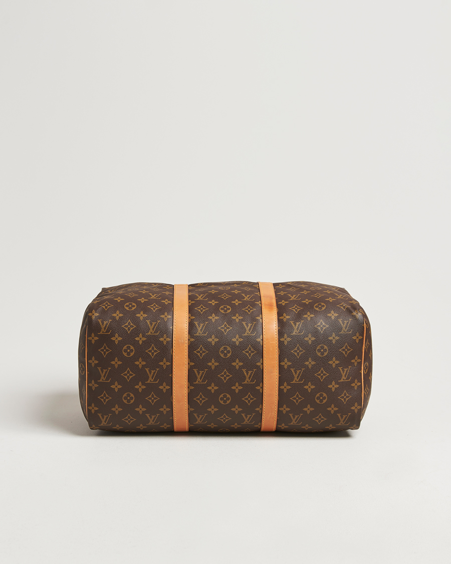 Homme | Louis Vuitton Pre-Owned Sac Souple 45 Monogram | Louis Vuitton Pre-Owned | Sac Souple 45 Monogram