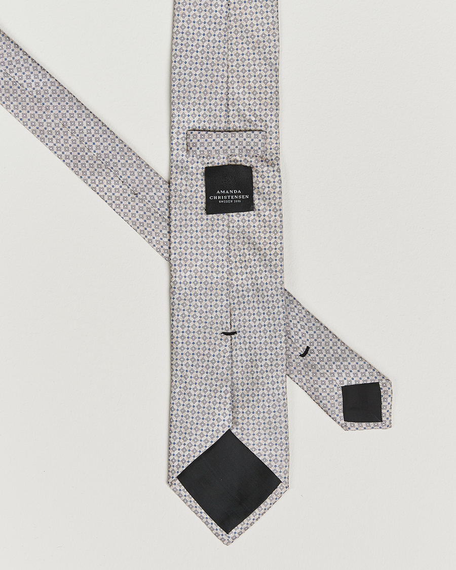 Homme | Amanda Christensen Silk Oxford Printed Micro Flower 8cm Tie Beige | Amanda Christensen | Silk Oxford Printed Micro Flower 8cm Tie Beige