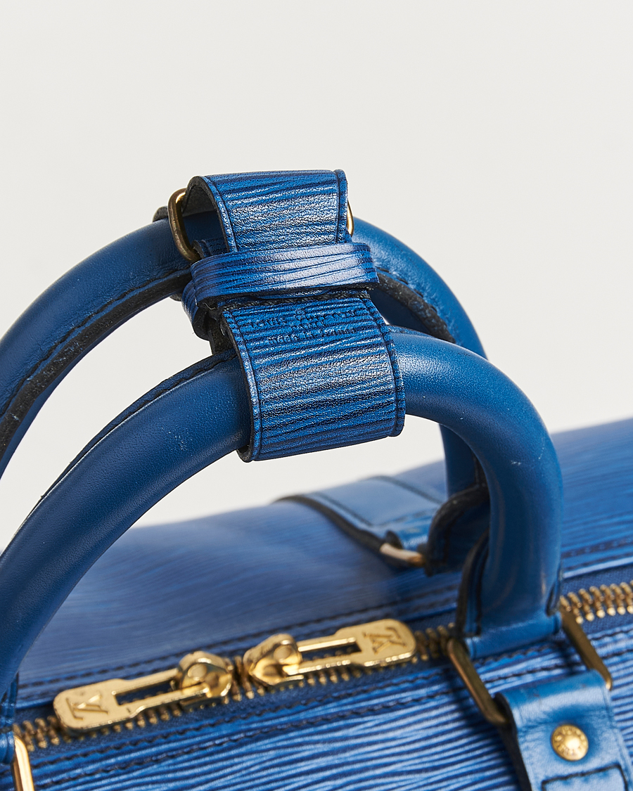 Homme | Louis Vuitton Pre-Owned Keepall 55 EPI Leather Bag Blue | Louis Vuitton Pre-Owned | Keepall 55 EPI Leather Bag Blue