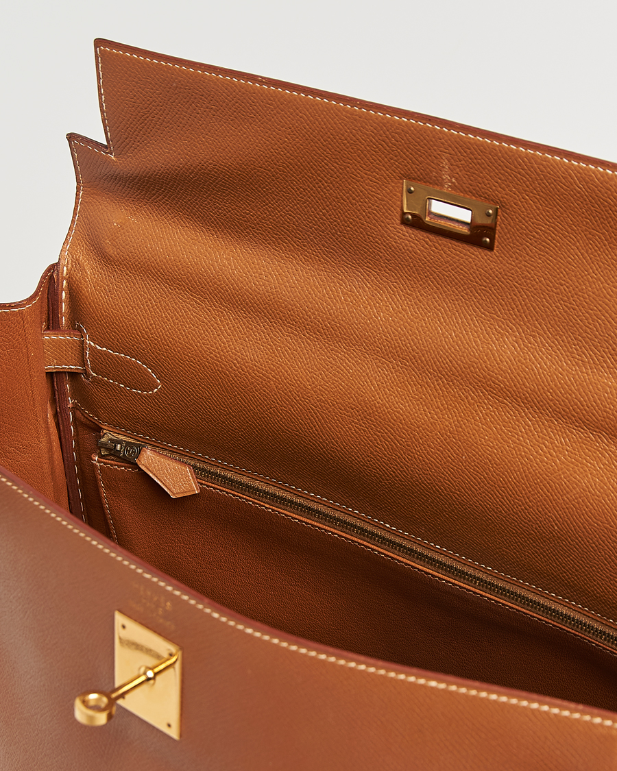 Homme | Hermès Pre-Owned Kelly 35 Courchevel Handbag Gold | Hermès Pre-Owned | Kelly 35 Courchevel Handbag Gold