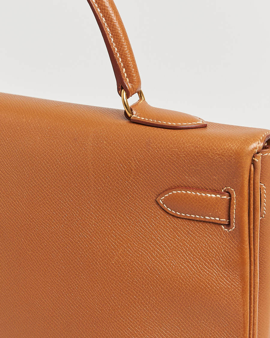 Homme | Hermès Pre-Owned Kelly 35 Courchevel Handbag Gold | Hermès Pre-Owned | Kelly 35 Courchevel Handbag Gold