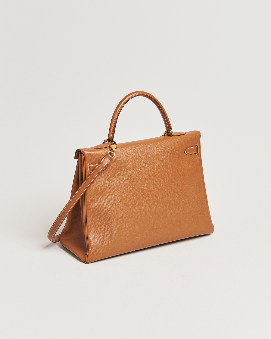Homme | Hermès Pre-Owned Kelly 35 Courchevel Handbag Gold | Hermès Pre-Owned | Kelly 35 Courchevel Handbag Gold