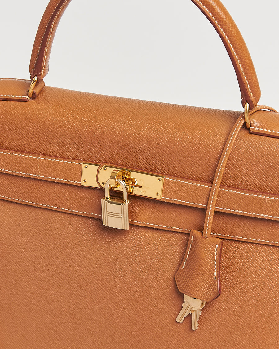 Homme | Hermès Pre-Owned Kelly 35 Courchevel Handbag Gold | Hermès Pre-Owned | Kelly 35 Courchevel Handbag Gold