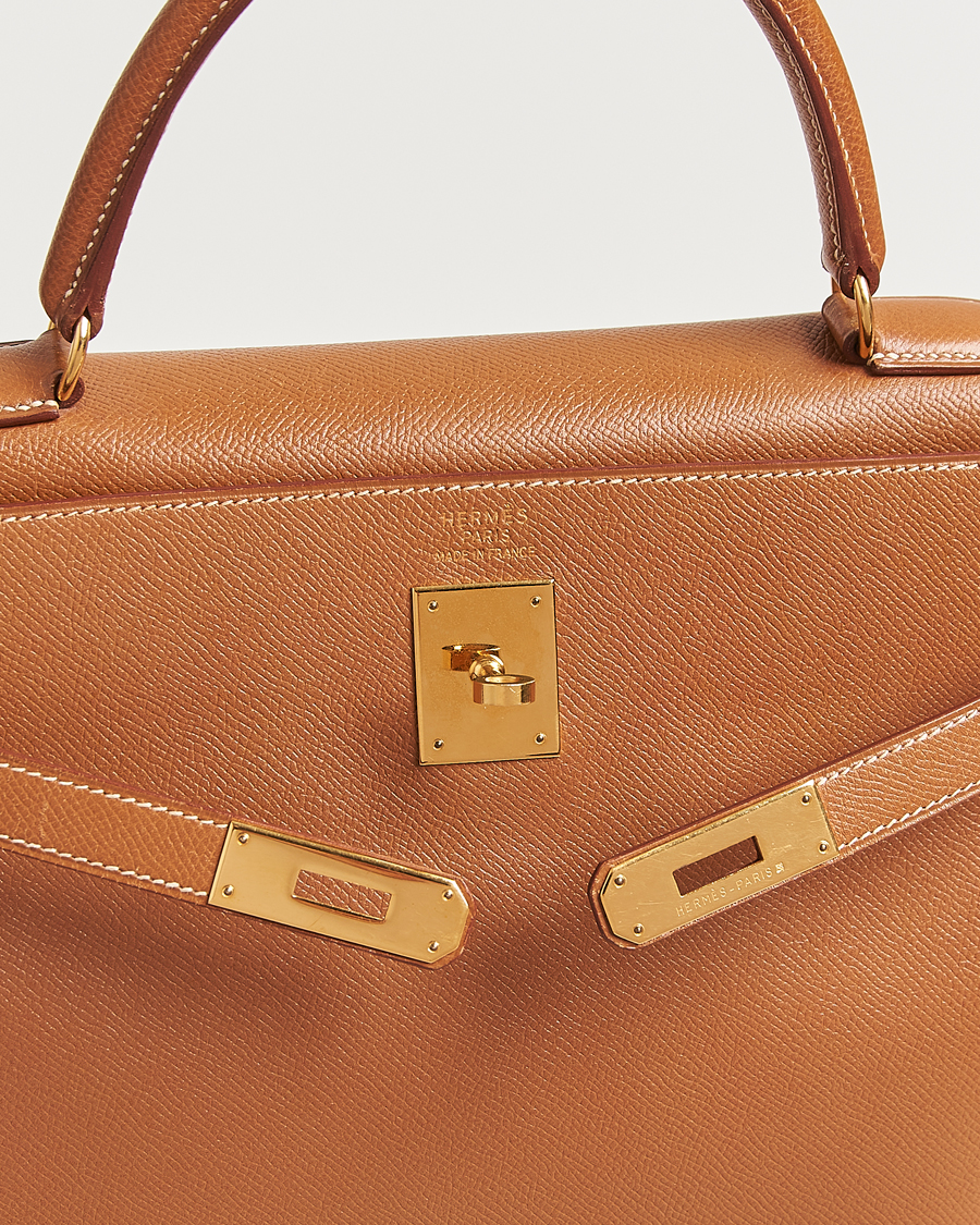 Homme | Hermès Pre-Owned Kelly 35 Courchevel Handbag Gold | Hermès Pre-Owned | Kelly 35 Courchevel Handbag Gold
