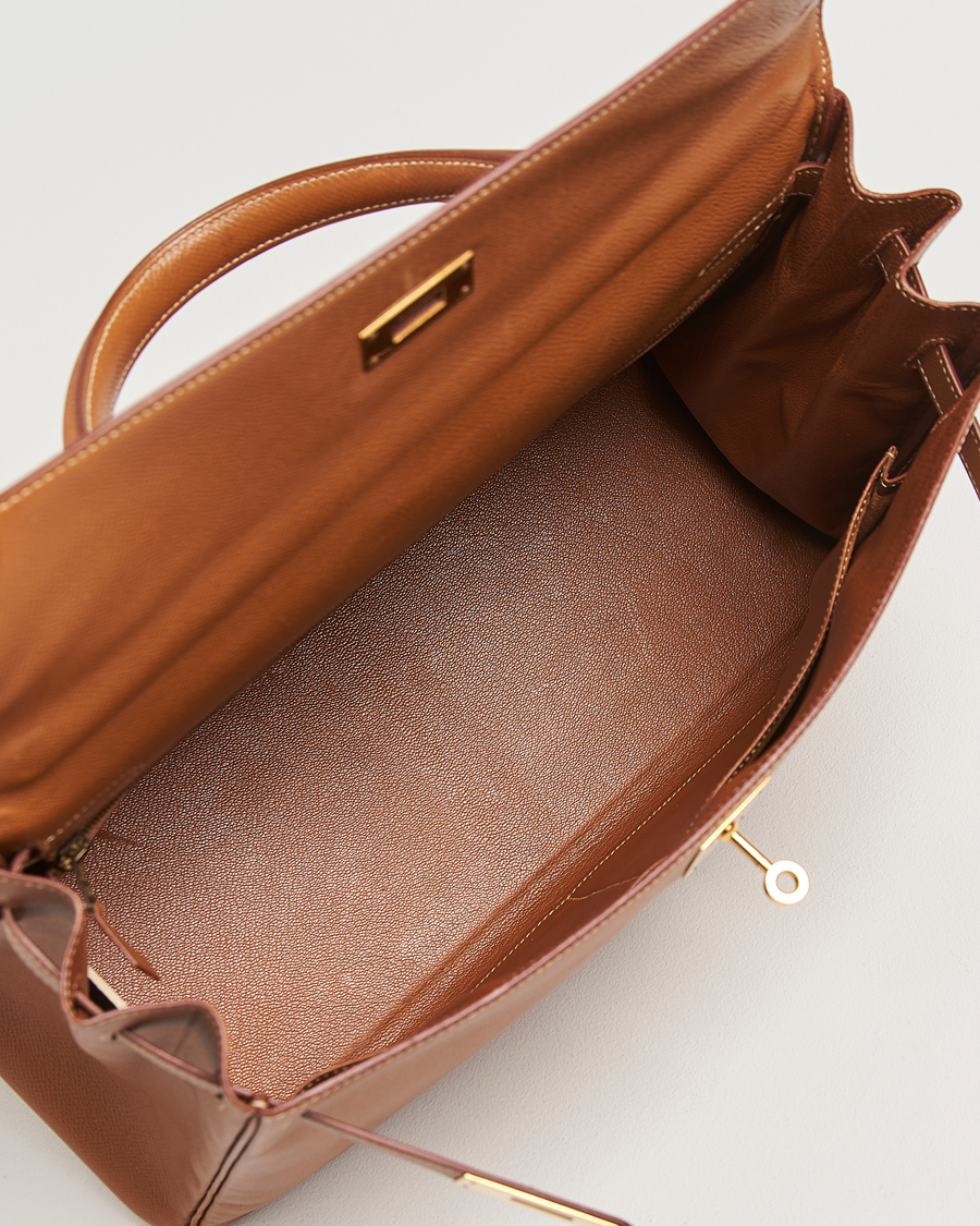 Homme | Hermès Pre-Owned Kelly 35 Courchevel Handbag Gold | Hermès Pre-Owned | Kelly 35 Courchevel Handbag Gold