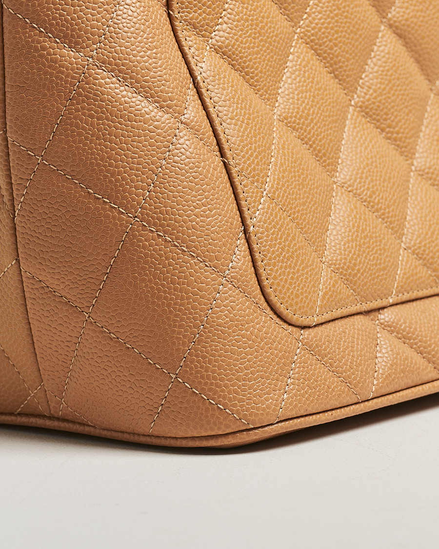 Homme | Chanel Pre-Owned Medallion Tote Quilted Caviar Beige | Chanel Pre-Owned | Medallion Tote Quilted Caviar Beige