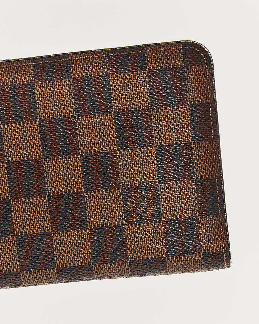 Homme | Louis Vuitton Pre-Owned Porte Monnaie Zippy Wallet Damier Ebene | Louis Vuitton Pre-Owned | Porte Monnaie Zippy Wallet Damier Ebene