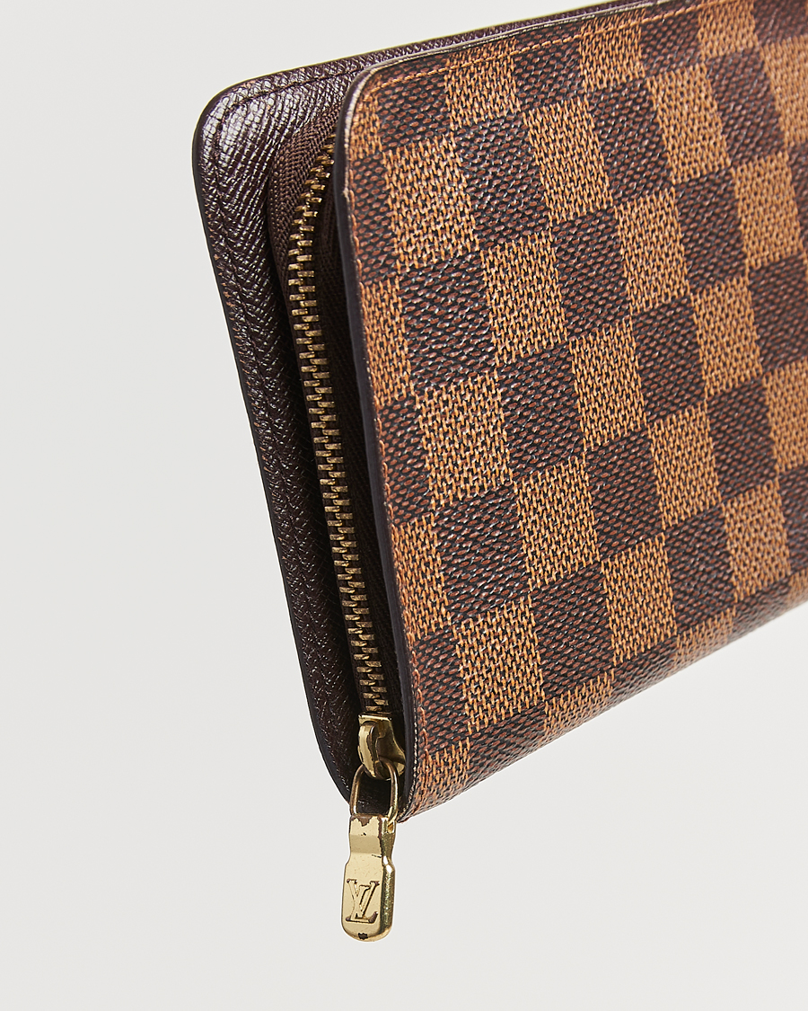 Homme | Louis Vuitton Pre-Owned Porte Monnaie Zippy Wallet Damier Ebene | Louis Vuitton Pre-Owned | Porte Monnaie Zippy Wallet Damier Ebene