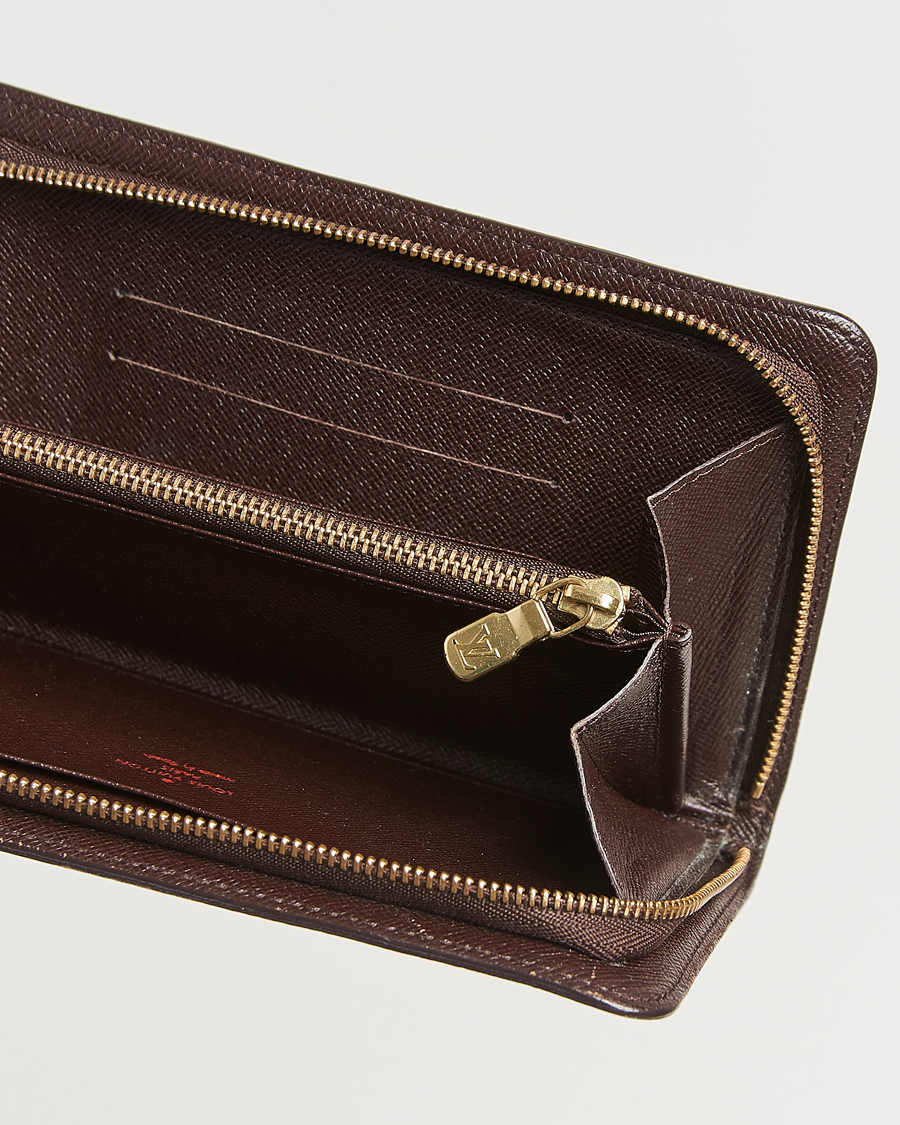 Homme | Louis Vuitton Pre-Owned Porte Monnaie Zippy Wallet Damier Ebene | Louis Vuitton Pre-Owned | Porte Monnaie Zippy Wallet Damier Ebene