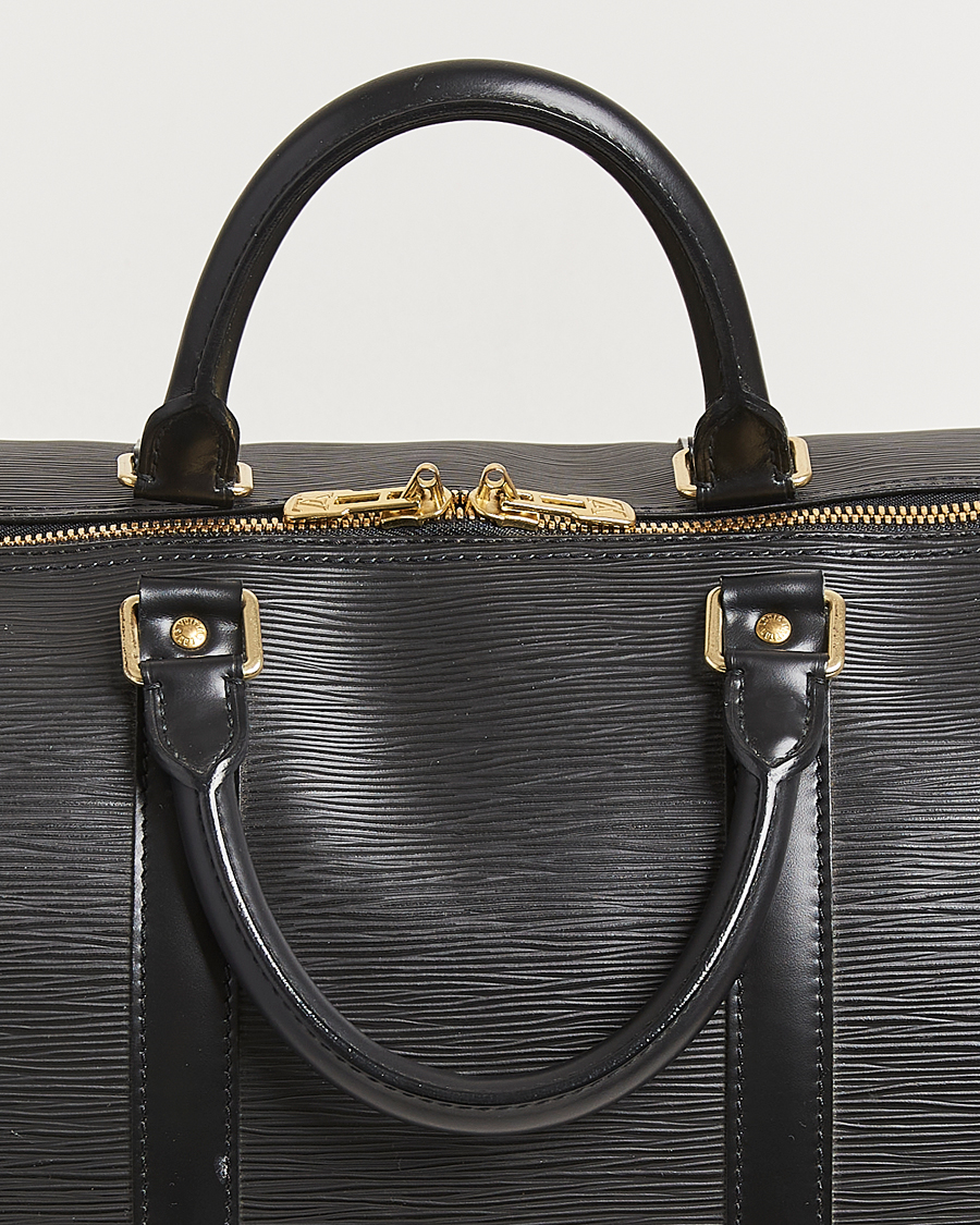 Homme | Louis Vuitton Pre-Owned Keepall 55 Epi Leather Bag Black | Louis Vuitton Pre-Owned | Keepall 55 Epi Leather Bag Black