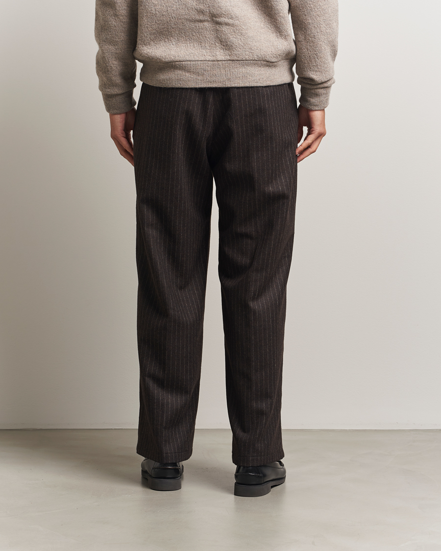 Homme | Pantalons | NN07 | Kay Wool Pleated Pinstriped Trousers Brown
