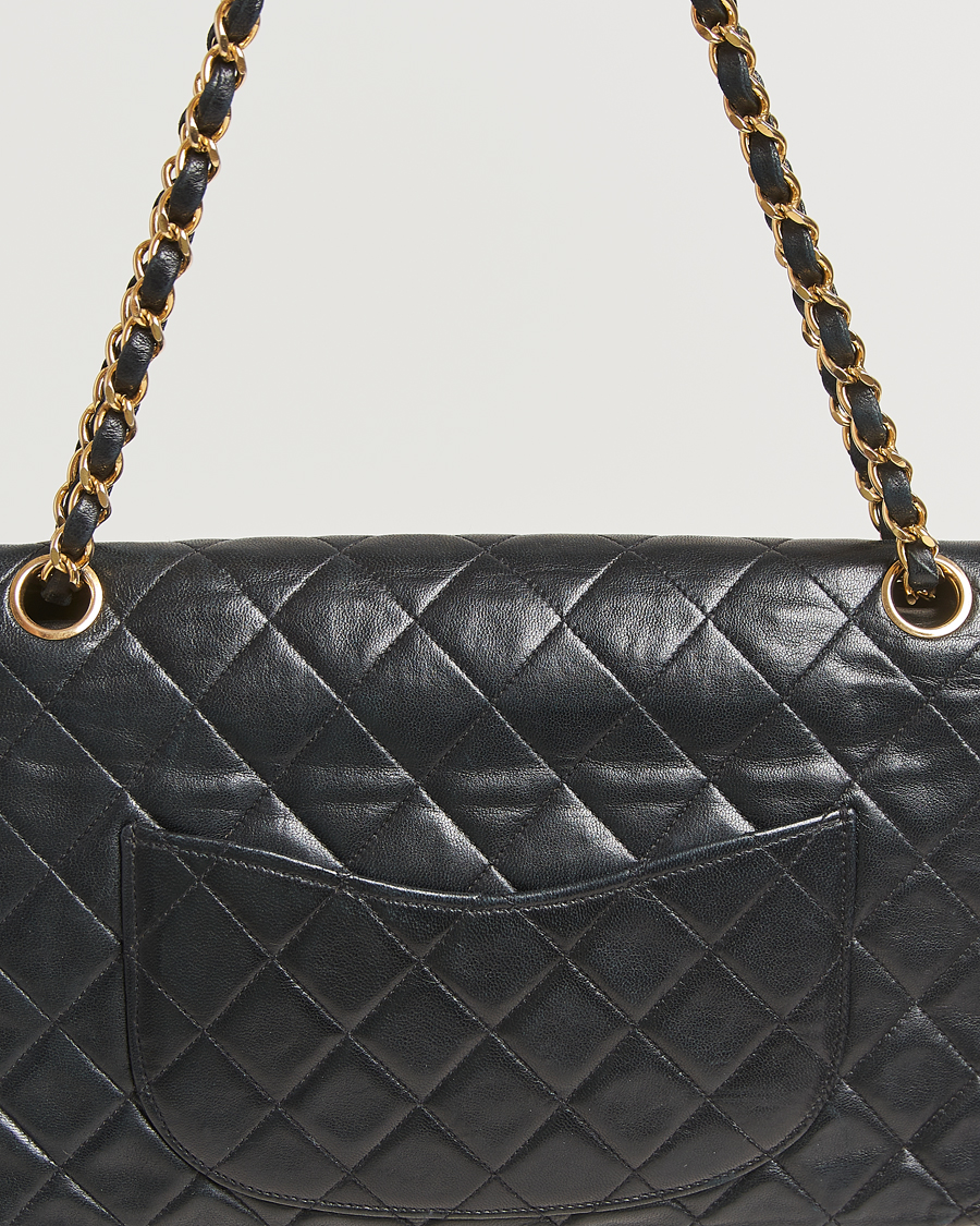 Homme | Pre-Owned & Vintage Bags | Chanel Pre-Owned | Classic Double Flap Medium Lambskin Black