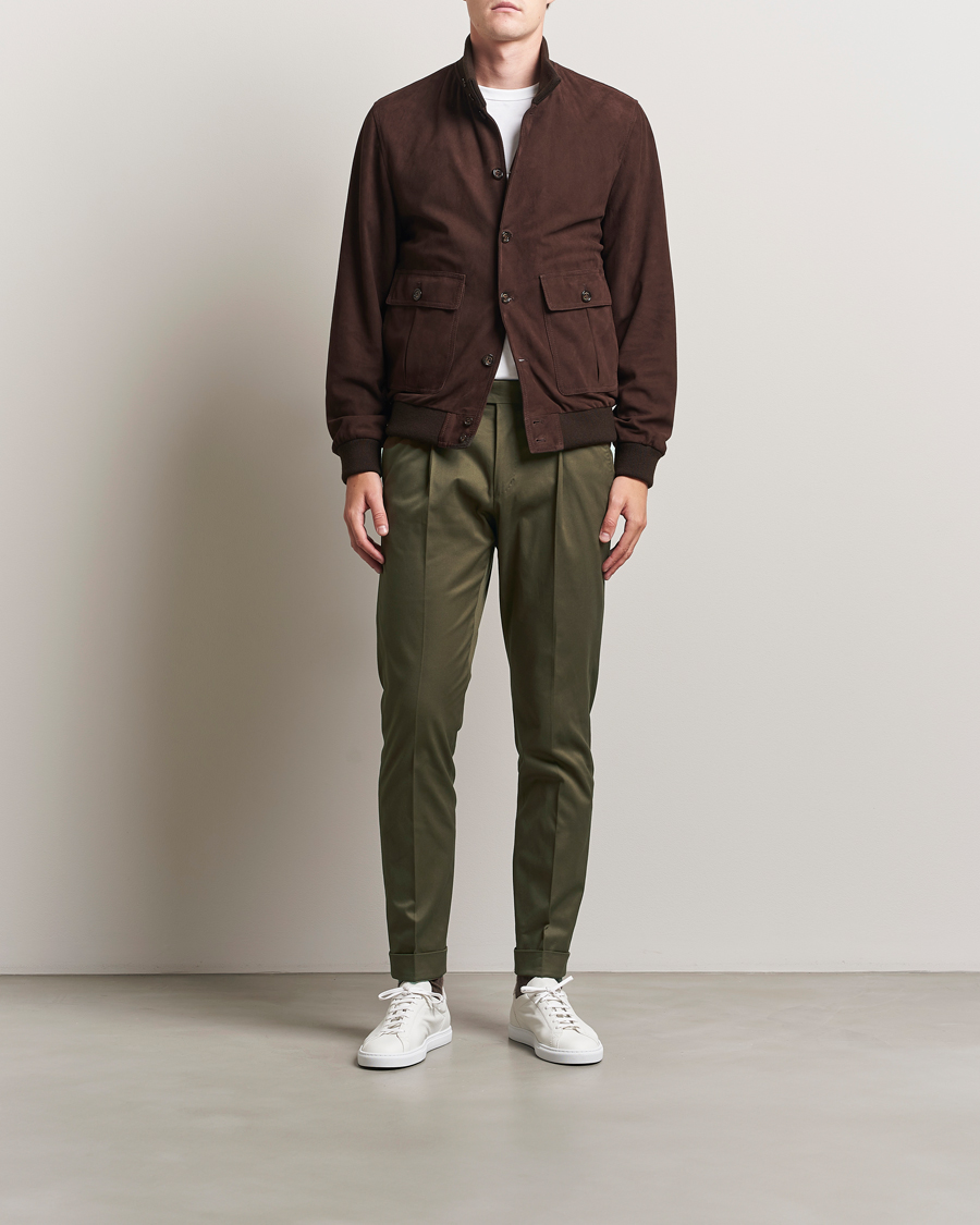 Homme | Pantalons | Tiger of Sweden | Tenuta Pleated Cotton Trousers Deep Olive