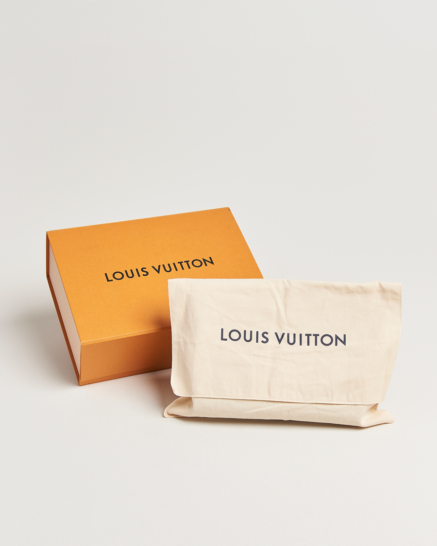 Homme | Pre-Owned & Vintage Bags | Louis Vuitton Pre-Owned | Pochette Voyage Taiga MM Black