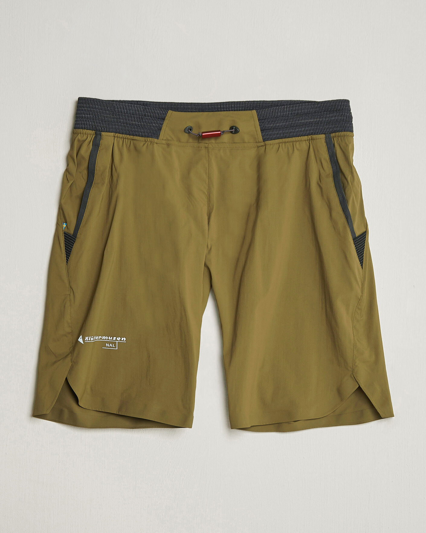 Homme | Shorts | Klättermusen | Nal Windbreaker Shorts Olive