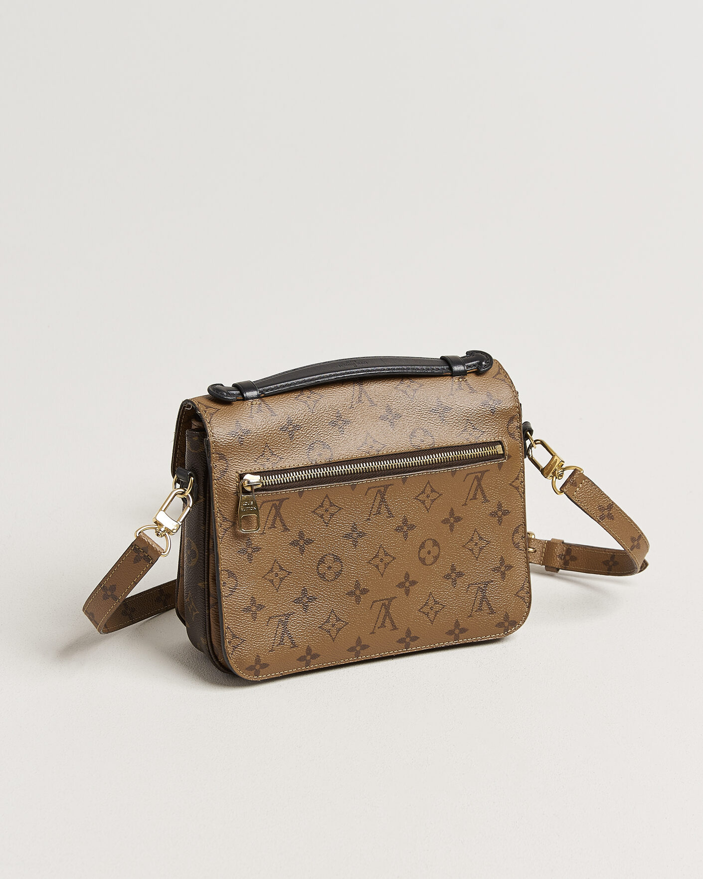 Homme | Pre-Owned & Vintage Bags | Louis Vuitton Pre-Owned | Pochette Métis Reverse Monogram