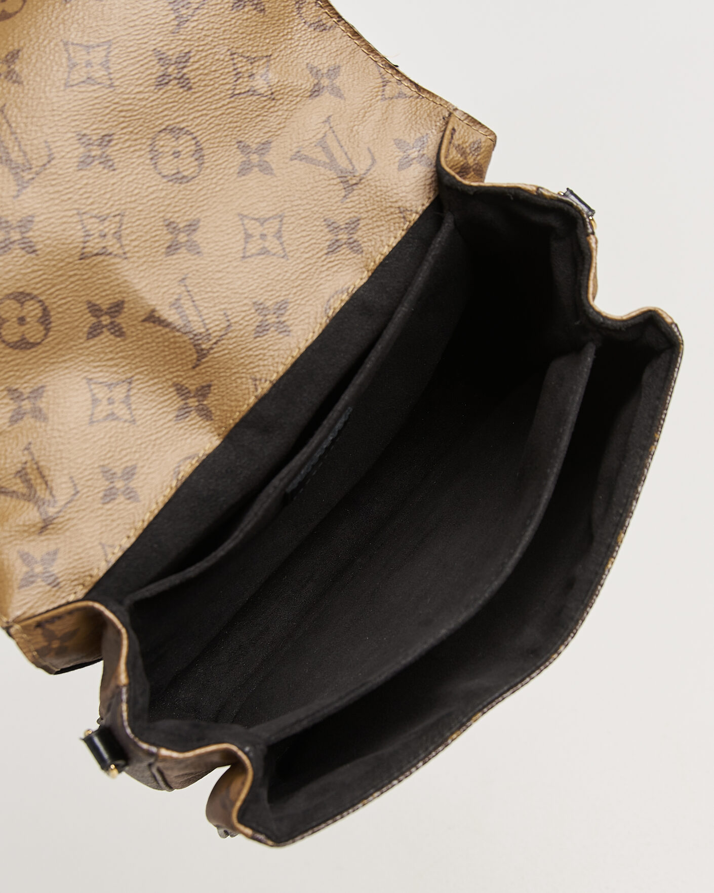 Homme | Pre-Owned & Vintage Bags | Louis Vuitton Pre-Owned | Pochette Métis Reverse Monogram
